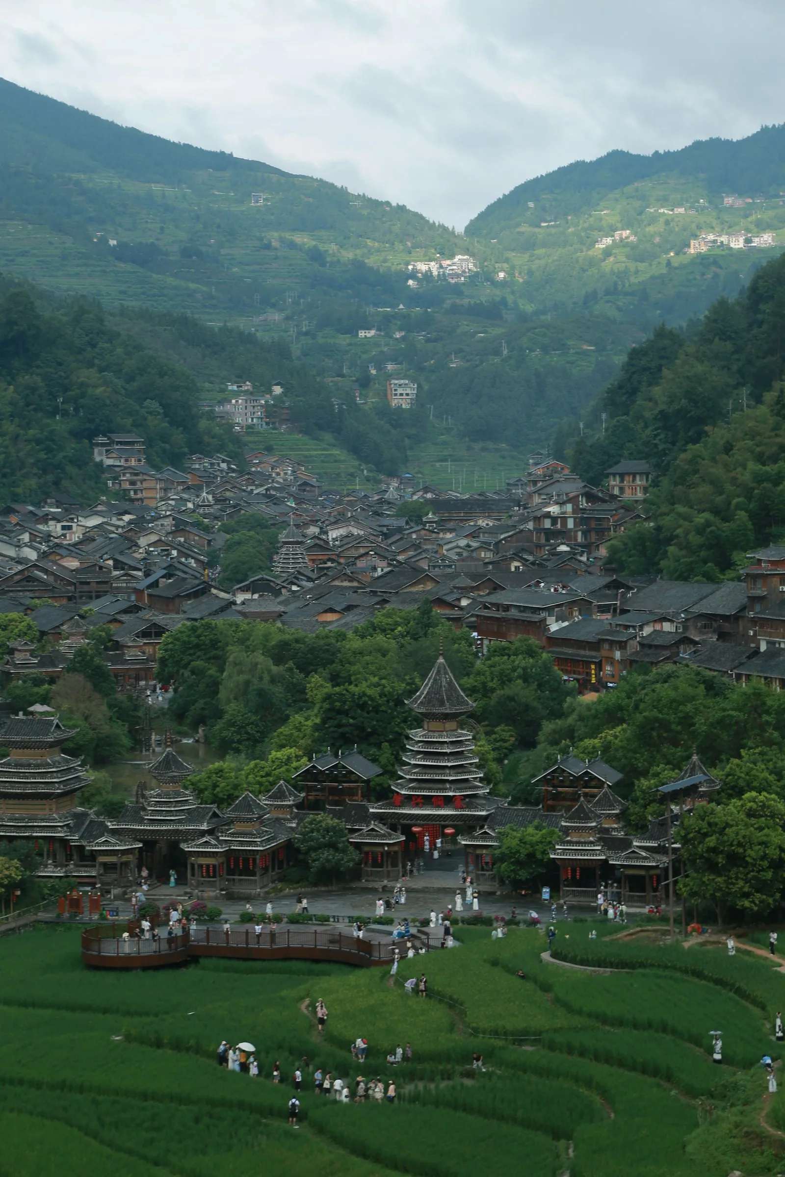 Stone-walled Tunbao village courtyard with slate roofs in Guizhou.