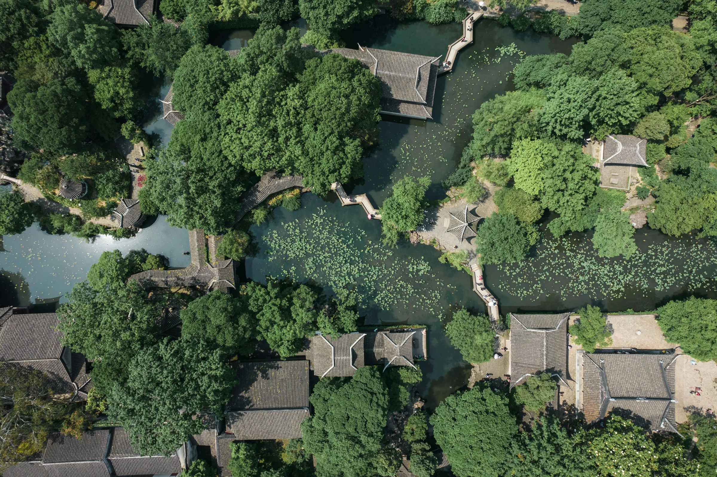 A framed view through a moon gate at the Humble Administrator's Garden in Suzhou.