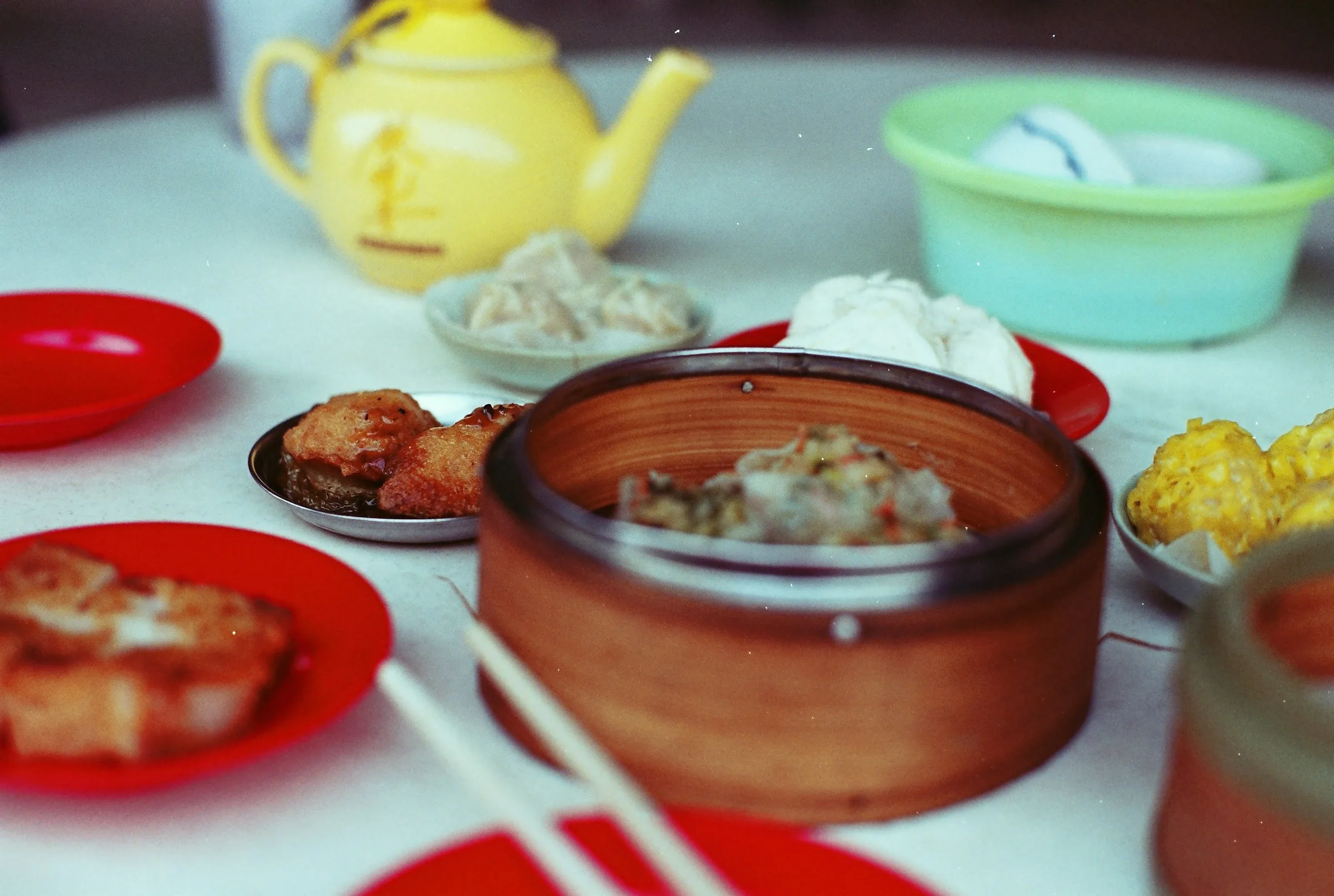 A Cantonese yum cha service — dim sum dishes set out on a table.